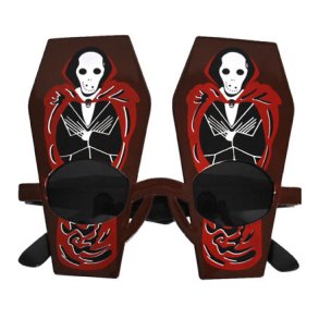 Briller med Dracula i kister 