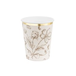 Beigefrgade koppar med blommigt tryck