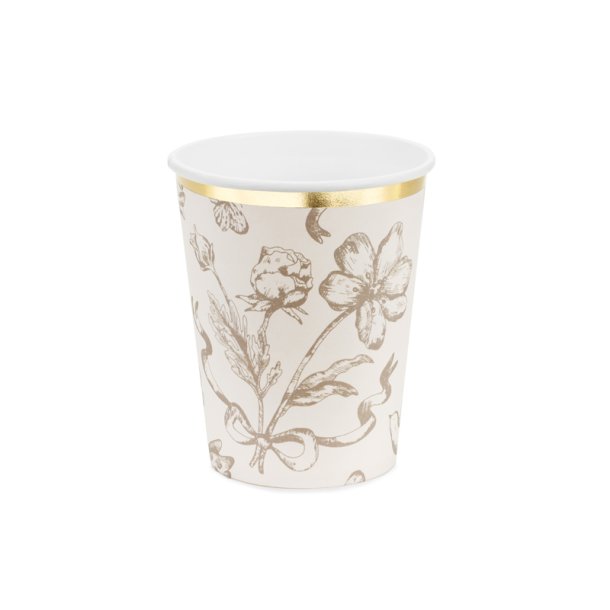 Beigefrgade koppar med blommigt tryck