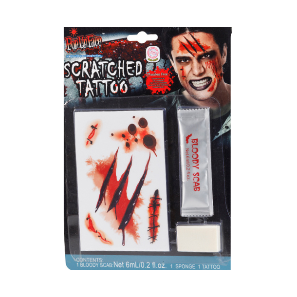 Scratched tattovering med blod