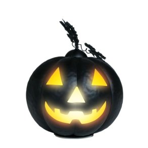 Sort grskar i metal med lys